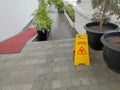 SIGNS OF WET FLOORS ON TERRACE Royalty Free Stock Photo