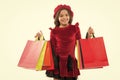 Signs you are addicted to shopping. Kid cute little girl hold bunch shopping bags. Child satisfied by shopping isolated Royalty Free Stock Photo