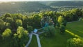 Sigulda, Latvia: 24 june 2022: An aerial view An unused ferris wheel stands in a green park on a sunny summer evening.