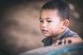 Cambodian child play in slum village near Otres Beach in Sihanoukville