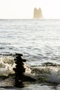 Sihlouetted Cairn in the Ocean Royalty Free Stock Photo