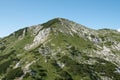 Sija peak during summer in sunny and cloudy day, view from footpath to Sija peak, Julian Alpe, Slovenia Royalty Free Stock Photo