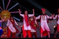 Sikh artists performing Bhangra dance on stage
