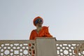 A sikh dressed in orange robes - Delhi