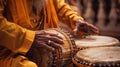 Sikh drummer in a yellow robe playing Indian tabla drums associated with the Baisakhi festival, banner Royalty Free Stock Photo