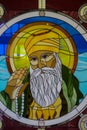 Sikh guru portrait on stained glass in the Sikh temple