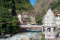 Sikh Gurudwara and a bridge across the river Parvati in the Himalayas. India Royalty Free Stock Photo