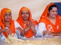 Sikh Ladies Making Bread And Celebrating Vaisakhi