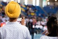 Sikh man Yellow head turban turn back view