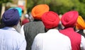 Sikh men wear turbans during a religious event
