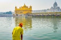 Sikh pilgrim praying in holy tank near Golden Temple Sri Harmandir Sahib, Amritsar, INDIA Royalty Free Stock Photo