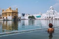 Sikh pilgrim in saint pool in Golden Temple, Amritsar