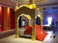 A Sikh prays at the altar with the Holy Book in the main prayer hall of the Guru Nanak Darbar Tatt Khalsa Diwan Gurdwara Sikh Tem
