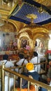 Sikh priests praying inside a gurudwara
