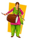 Sikh Punjabi Sardar woman playing dhol and dancing bhangra on holiday like Lohri or Vaisakhi