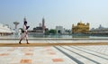 Sikh walking in the Golden Temple, Amritsar Royalty Free Stock Photo