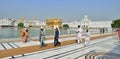 Sikh walking in the Golden Temple, Amritsar Royalty Free Stock Photo