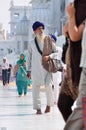 Sikh walking in the Golden Temple, Amritsar Royalty Free Stock Photo