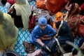 Sikh women and sons inside a temple in Mallorca detail Royalty Free Stock Photo