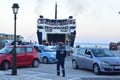 The inter island ferry docks at the Greek island of Sikinos. Passengers board and disembark.