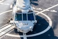 Sikorsky MH-60S Seahawk helicopter lands on the flight deck of the HTMS. Bhumibol Adulyadej stealth frigate of Royal Thai navy