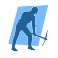 Silhouette of a man in worker costume carrying pick axe tool in action pose. Royalty Free Stock Photo