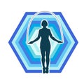 Silhouette of a slim sporty woman doing jump rope workout. Royalty Free Stock Photo
