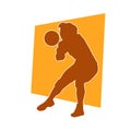 Silhouette of a female volley athlete in action pose. Royalty Free Stock Photo