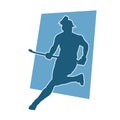 Silhouette of female field hockey athlete in action.