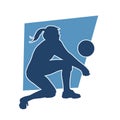 Silhouette of a female volley athlete in action pose. Royalty Free Stock Photo