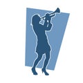 Silhouette of a woman musician playing trumpet brass musical instrument.