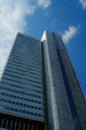 The 'silver tower' stretches towards the blue and white sky in Frankfurt, Germany. Royalty Free Stock Photo