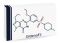 Sildenafil molecule. It is drug for the treatment of erectile dysfunction. Skeletal chemical formula. Paper packaging for drugs.