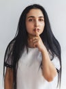 Silence gesture. Portrait of a young cute woman saying please keep calm sign Royalty Free Stock Photo