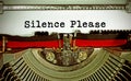 Silence Please written with an old typewriter