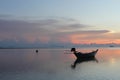 Silence and tranquility. Sunset boat. Royalty Free Stock Photo