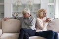 Silent ignoring older retired couple going through relationship problems Royalty Free Stock Photo