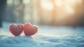 In the silent snow, two red hearts glow, revealing the warmth of true romance. Royalty Free Stock Photo