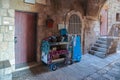 Silent streets of Jerusalem. A carriage with religious books stands in the Jewish quarter near a wall in the old city of Jerusalem