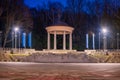 Silesian Park in Chorzow. Dance circle after renovation. A stone floor surrounded by an auditorium. Gloriette in the background Royalty Free Stock Photo