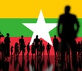 Silhoettes of unknown men and women on the flag of Myanmar background. 3d rendering