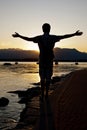 Silhouet against the sunset over Lake Viverone,