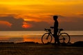 silhouett biker on track and sunrise background.