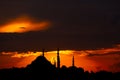 Silhouett of Suleymaniye Mosque at sunset with dramatic clouds