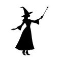 Silhouette of a Magical Witch Casting a Spell with Her Wand Royalty Free Stock Photo