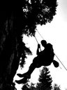 Silhouette of abseiler