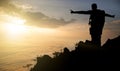 Silhouette adventurer team on the mountain and sunrise. Royalty Free Stock Photo