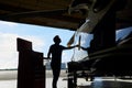 Silhouette Of Male Aero Engineer Working On Helicopter In Hangar Royalty Free Stock Photo