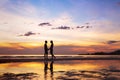 Silhouette of afectionate couple on the beach at sunset Royalty Free Stock Photo