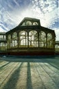 Silhouette against the sun of the Palacio de Cristal in Madrid\'s Retiro public park,